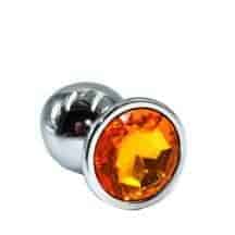 Анальная пробка Kanikule Large, серебристая с желтым кристаллом. Нет в наличии Анальная пробка Kanikule Large, серебристая с желтым кристаллом