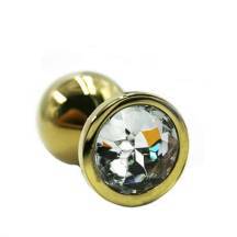 Анальная пробка Kanikule Small, золотистая с бесцветным кристаллом. Нет в наличии Анальная пробка Kanikule Small, золотистая с бесцветным кристаллом