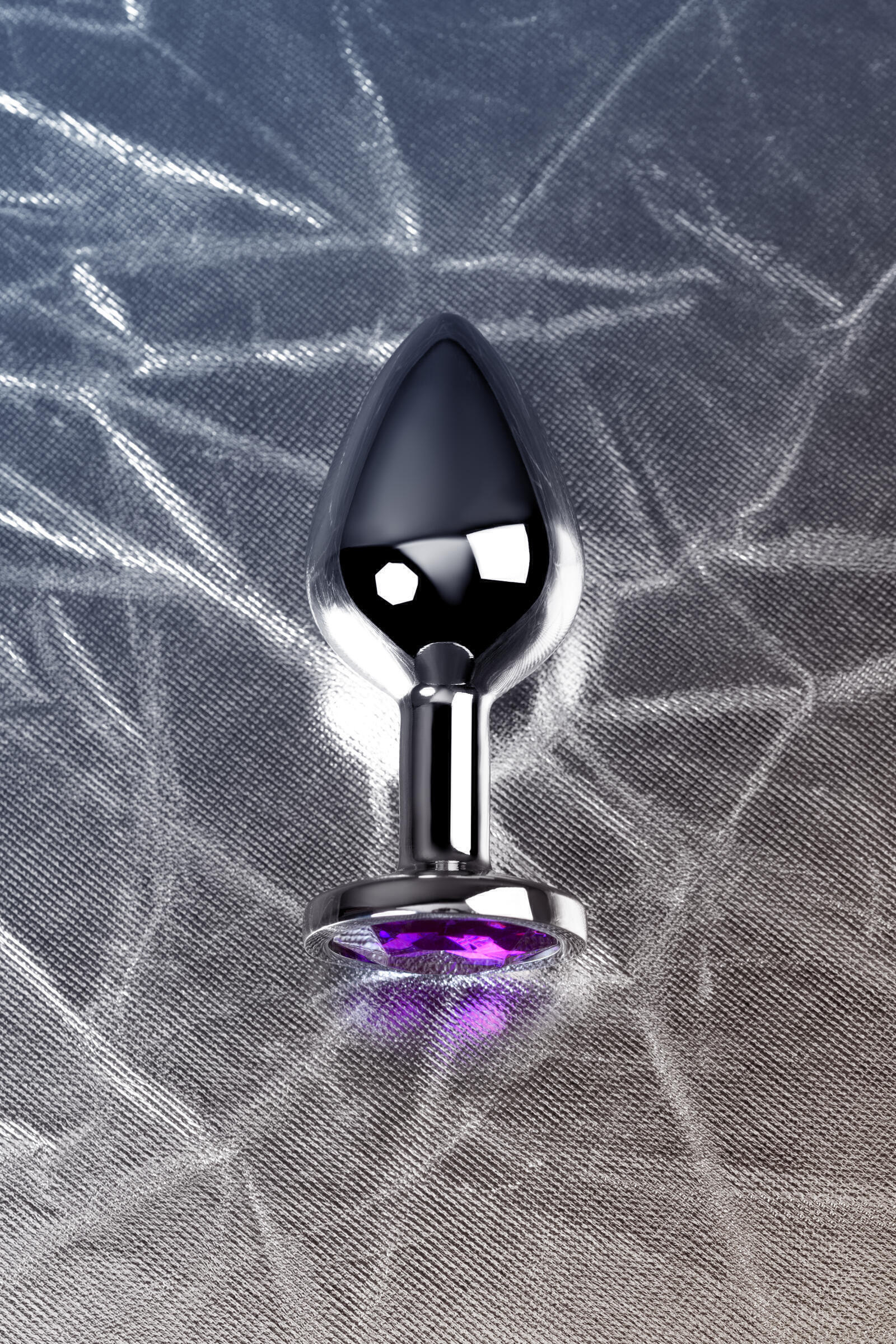 Анальная пробка Metal by Toyfа, серебристый, с кристаллом цвета аметист