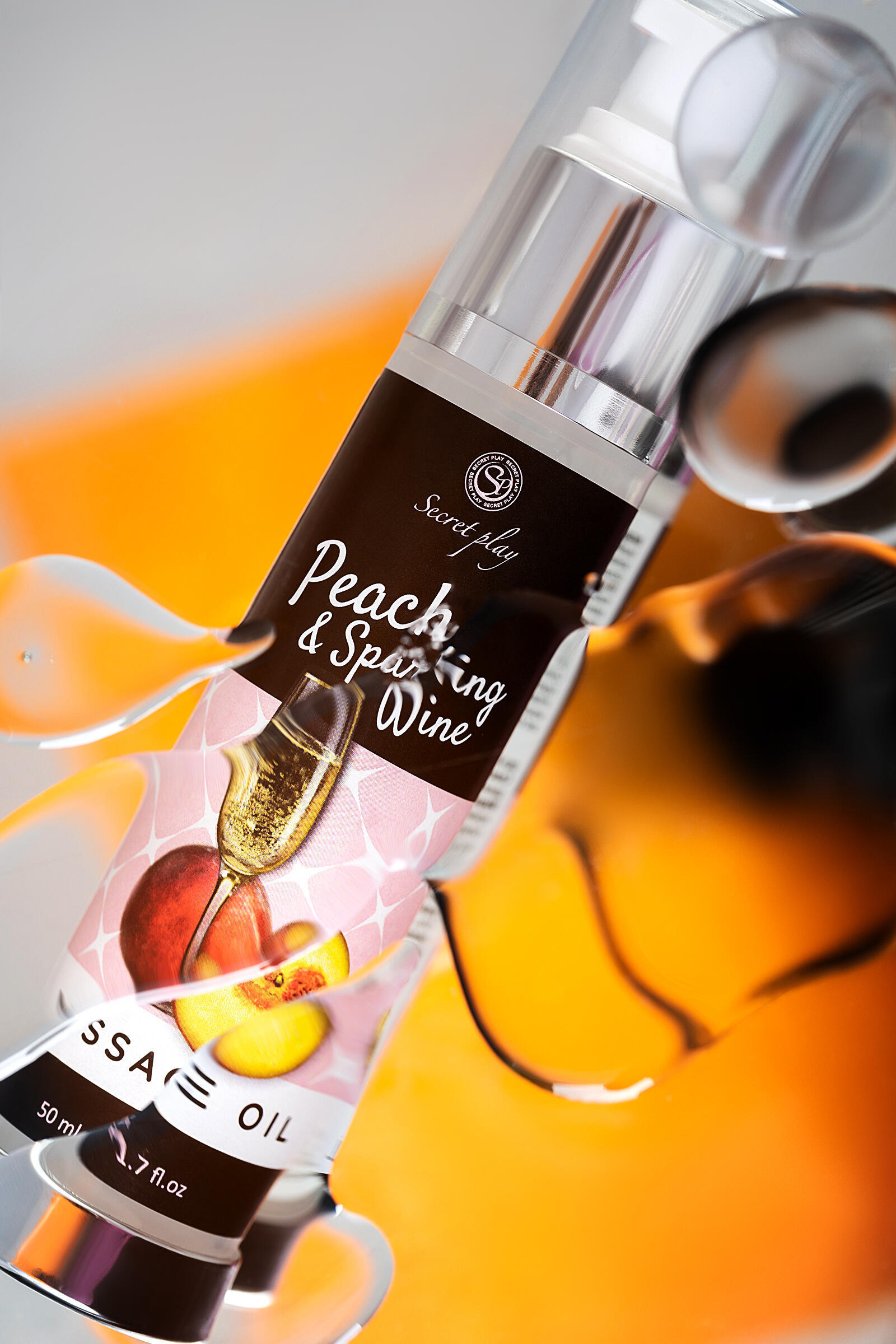Массажное масло Secret Play с ароматом персика и шампанского, 50 мл