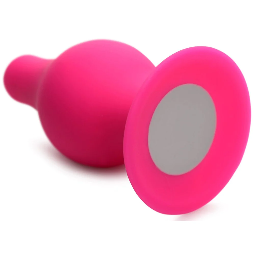 Мягкая анальная пробка XR Brands Squeeze-It Tapered Small, розовая