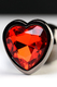 Анальная пробка Metal by Toyfa с кристаллом-сердце цвета рубин, темно-серебристая